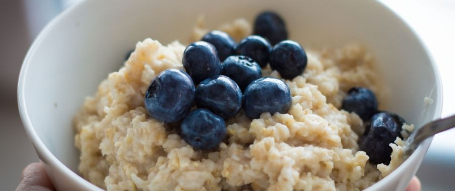 A bowel of porridge with blueberry's 