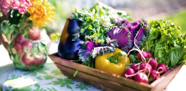 Wooden tray containing vegetables 