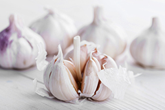 The active ingredients in garlic are believed to benefit the cardiovascular system by reducing potentially harmful levels of cholesterol in the body.
